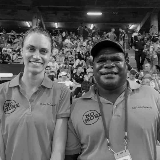 NO MORE Campaign workers, Alex Billeter and Kevin Baxter at the NTFL Grand Final.