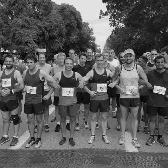 Masters runners all link up to say NO MORE to family violence. 