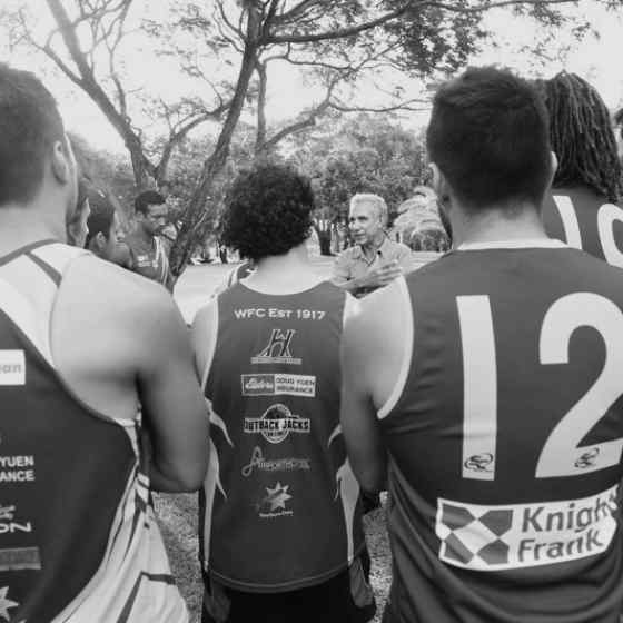 Charlie explaining No More and Dvaps to NTFL premiers Wanderers