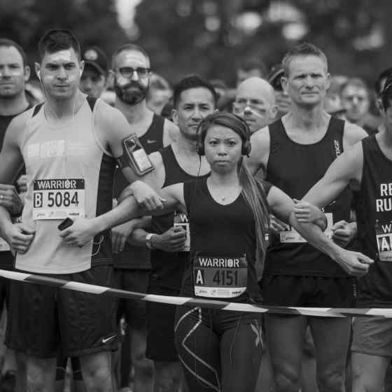 Runners link up at the start of the 10km run. 