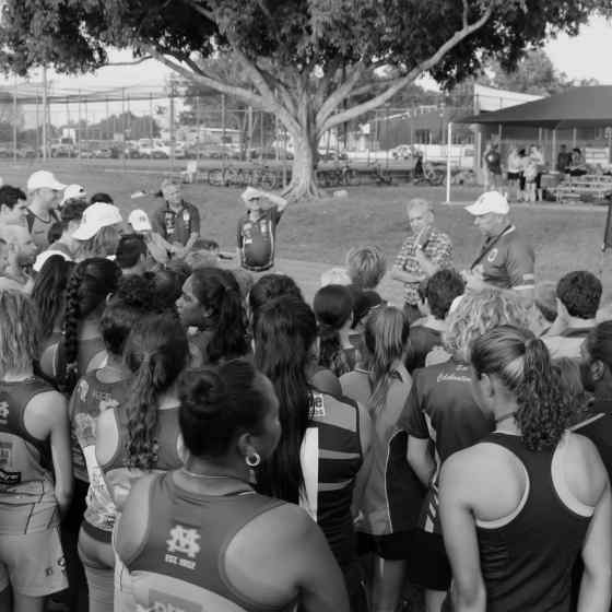 Charlie King talks to St Mary's Football Club members about family violence. 