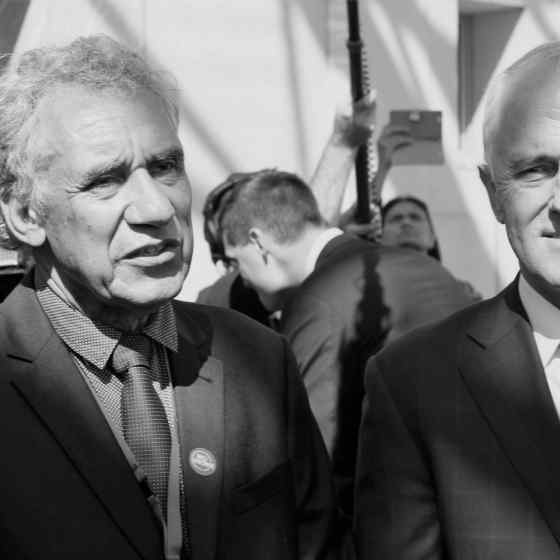 NO MORE Campaign Founder Charlie King addresses the crowd to talk about the campaign origins and the symbolic linking or arms.