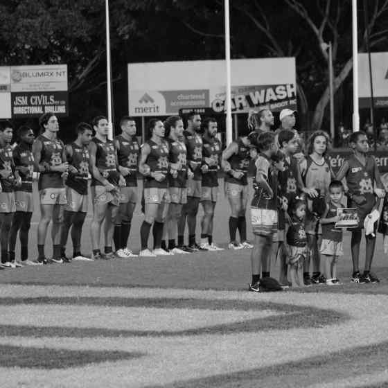 St Marys seniors and juniors link arms.