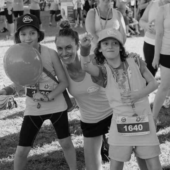 NO MORE Campaign worker Alex with 2 of the NO MORE team runners after the race.